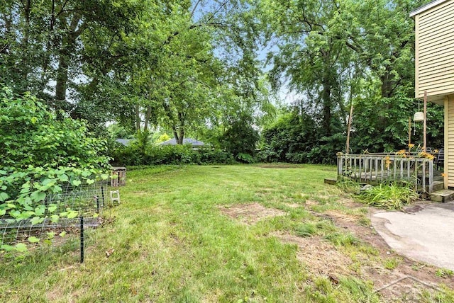 3704 Concord St, Midland, MI 48642 - view of grassy yard featuring a wooden deck