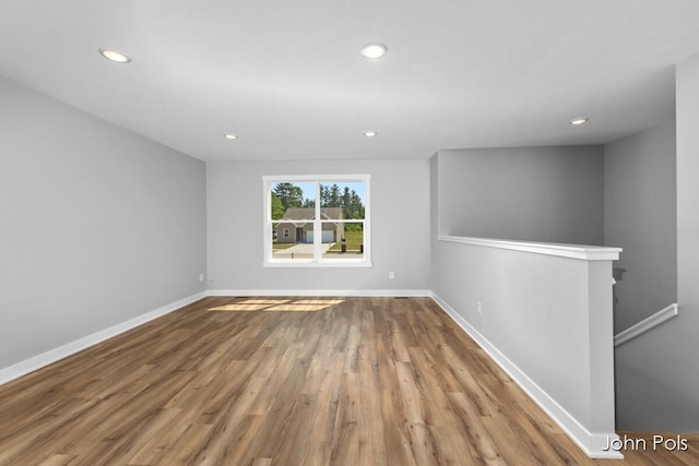 1025 Mechanic St, Big Rapids, MI 49307 - unfurnished room featuring wood finished floors and recessed lighting