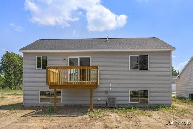1025 Mechanic St, Big Rapids, MI 49307 - rear view of house featuring roof with shingles