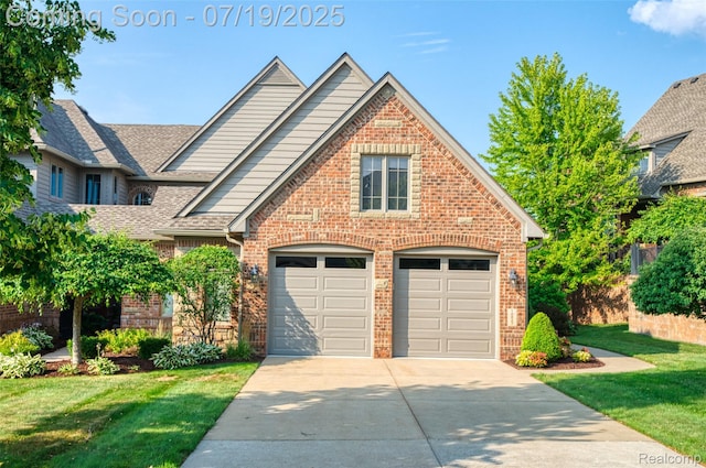 10827 Sparkling Waters Ct, South Lyon, MI 48178 - view of front facade featuring brick siding, driveway, a front yard, roof with shingles, and a garage