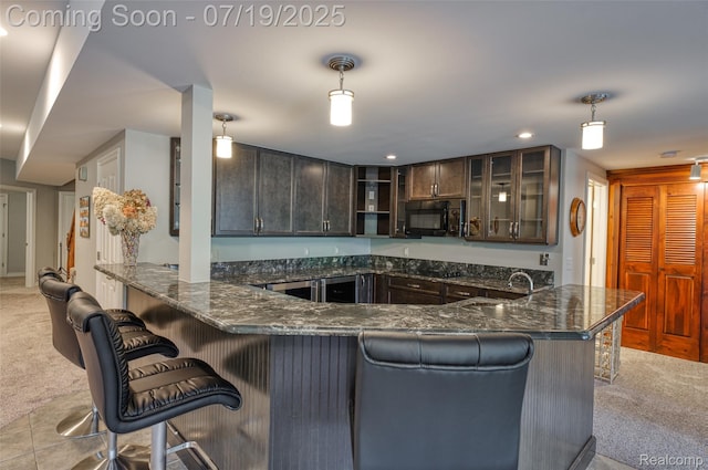 10827 Sparkling Waters Ct, South Lyon, MI 48178 - kitchen with a peninsula, light carpet, open shelves, dark stone countertops, and recessed lighting