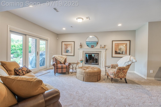 10827 Sparkling Waters Ct, South Lyon, MI 48178 - living area featuring carpet floors, recessed lighting, and a fireplace