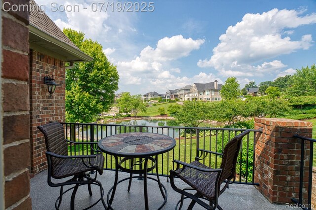 10827 Sparkling Waters Ct, South Lyon, MI 48178 - balcony with a water view