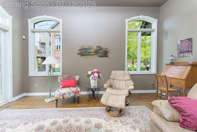 10827 Sparkling Waters Ct, South Lyon, MI 48178 - living area featuring wood finished floors and plenty of natural light