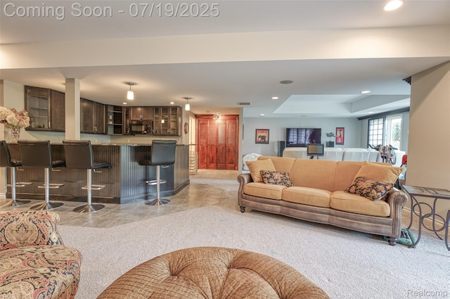 10827 Sparkling Waters Ct, South Lyon, MI 48178 - living area featuring bar with sink and recessed lighting