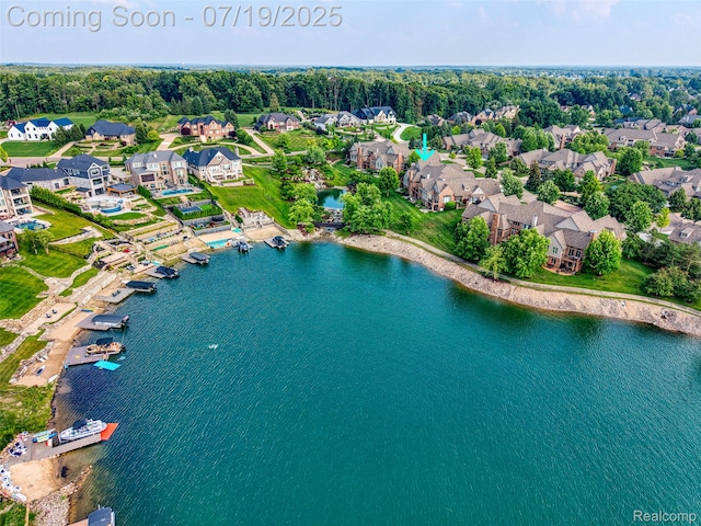 10827 Sparkling Waters Ct, South Lyon, MI 48178 - aerial view of residential area with a large body of water
