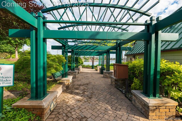 10827 Sparkling Waters Ct, South Lyon, MI 48178 - view of patio / terrace with a pergola