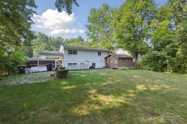 3118 Spruce St, Midland, MI 48640 - rear view of house featuring a shed and a patio area