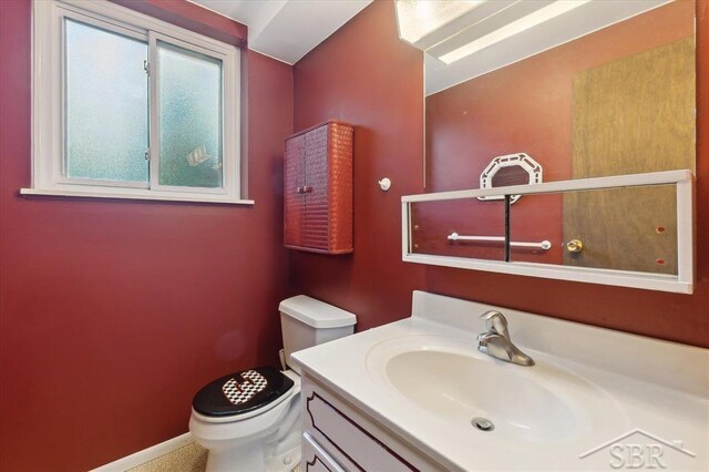 3118 Spruce St, Midland, MI 48640 - bathroom featuring vanity and toilet