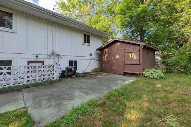 3118 Spruce St, Midland, MI 48640 - view of property exterior with a storage shed, a patio area, and a yard