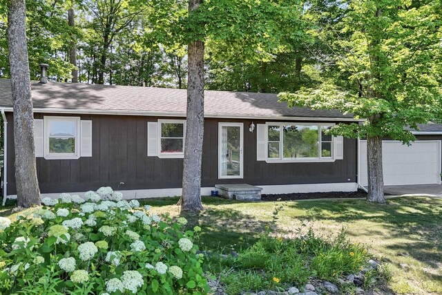 5674 Goodrick Rd, Traverse City, MI 49684 - photo 1