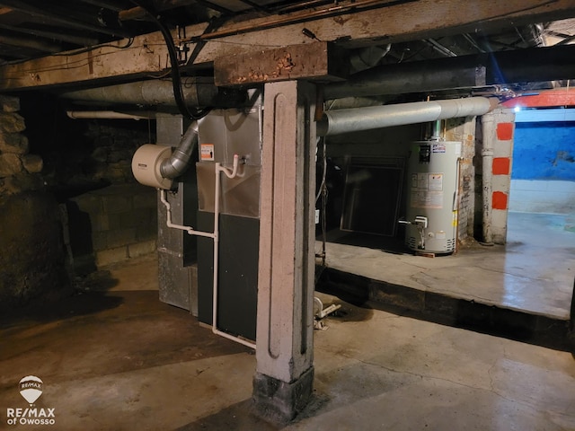 725 River St, Owosso, MI 48867 - unfinished basement with water heater