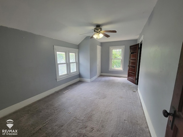 725 River St, Owosso, MI 48867 - empty room with ceiling fan and carpet floors