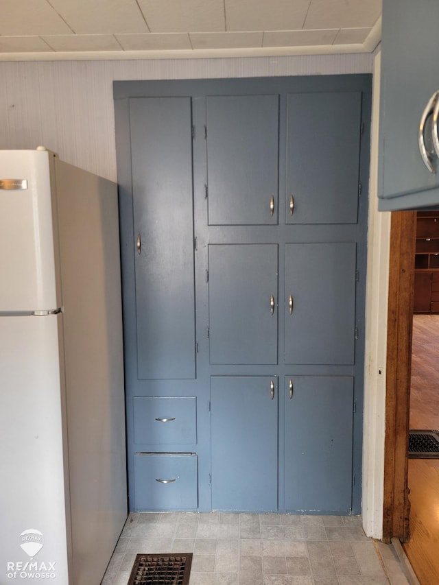 725 River St, Owosso, MI 48867 - kitchen with freestanding refrigerator