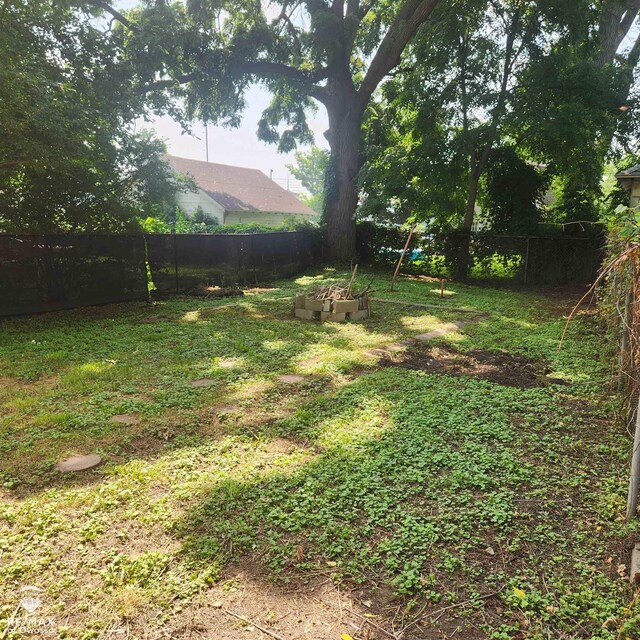 725 River St, Owosso, MI 48867 - view of fenced backyard