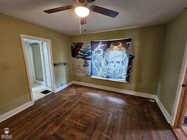 725 River St, Owosso, MI 48867 - empty room with a ceiling fan and baseboards