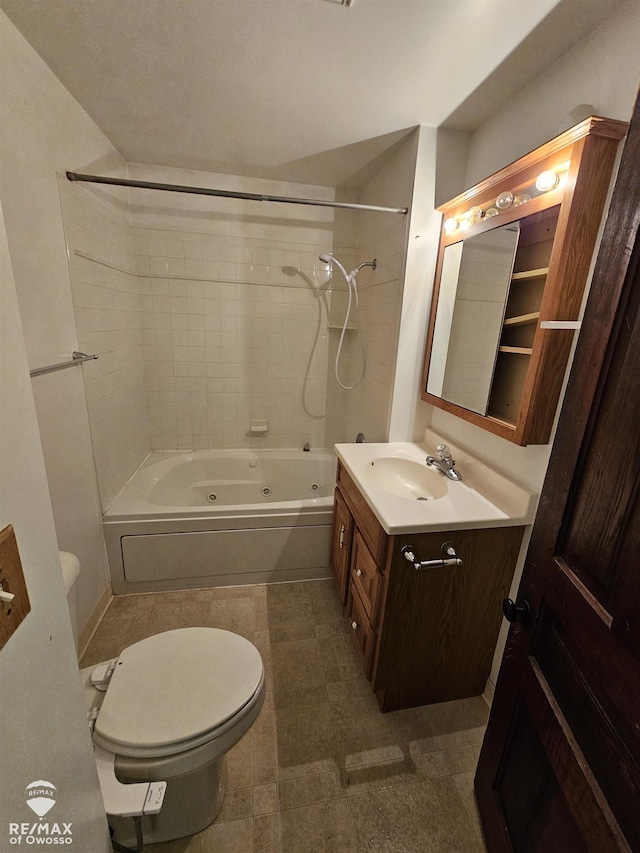 725 River St, Owosso, MI 48867 - bathroom featuring a combined bath / shower with jetted tub and vanity
