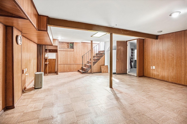 2551 Elmwood Ave, Ann Arbor, MI 48104 - finished basement with wooden walls, stairway, and light flooring