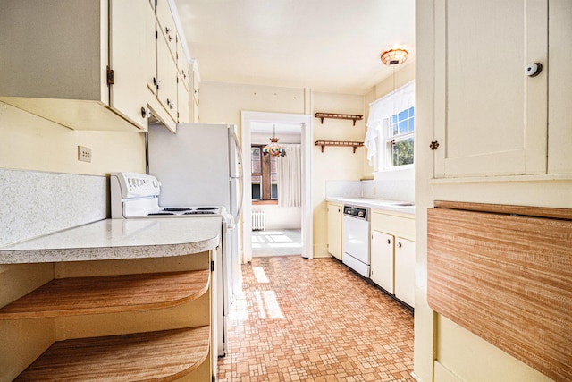 2551 Elmwood Ave, Ann Arbor, MI 48104 - kitchen featuring white appliances, open shelves, light countertops, and white cabinets
