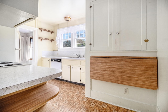 2551 Elmwood Ave, Ann Arbor, MI 48104 - kitchen featuring white appliances, light countertops, and white cabinets