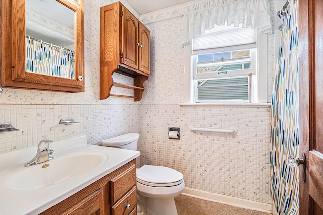 2551 Elmwood Ave, Ann Arbor, MI 48104 - full bathroom with vanity, wainscoting, a shower with shower curtain, tile walls, and wallpapered walls