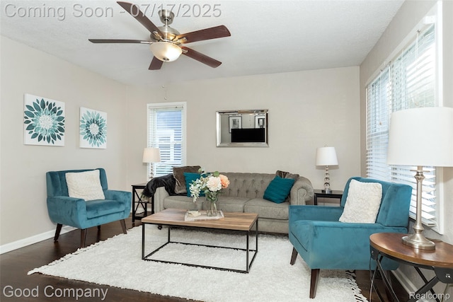2404 Rowland Ave, Royal Oak, MI 48067 - living area with wood finished floors, plenty of natural light, and a ceiling fan