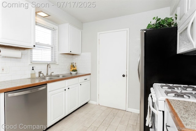 2404 Rowland Ave, Royal Oak, MI 48067 - kitchen with white appliances, white cabinetry, backsplash, and light countertops