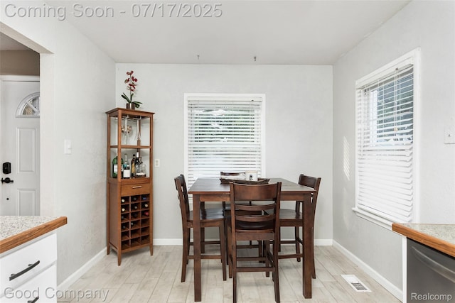 2404 Rowland Ave, Royal Oak, MI 48067 - dining room with light wood-type flooring