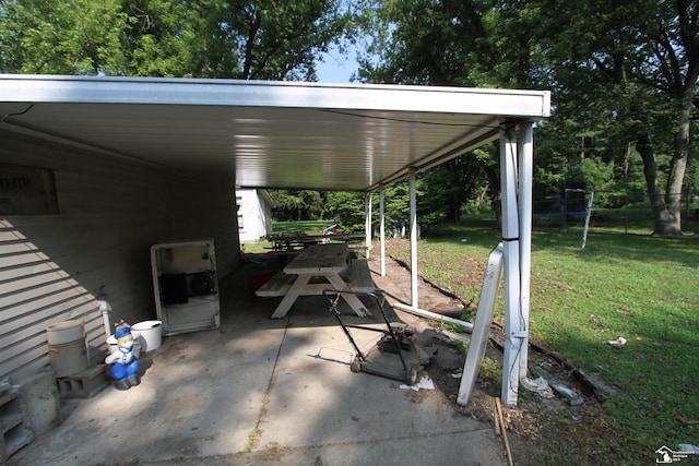 15439 Keegan Rd, Monroe, MI 48161 - view of parking / parking lot with an attached carport