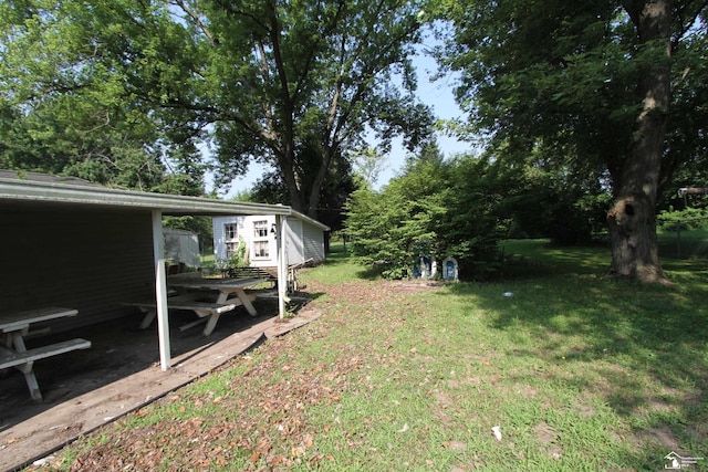 15439 Keegan Rd, Monroe, MI 48161 - view of grassy yard with an outbuilding