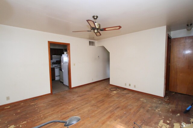 15439 Keegan Rd, Monroe, MI 48161 - empty room featuring a ceiling fan and light wood-style flooring