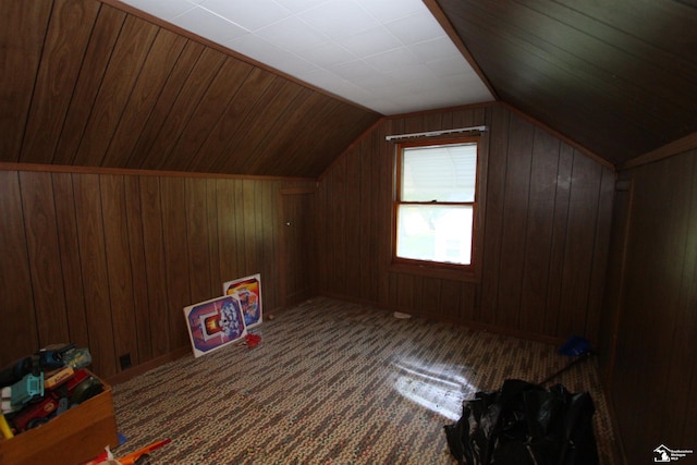 15439 Keegan Rd, Monroe, MI 48161 - additional living space with wooden walls, vaulted ceiling, and carpet floors
