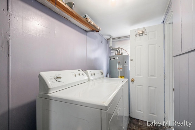 washroom featuring independent washer and dryer and water heater