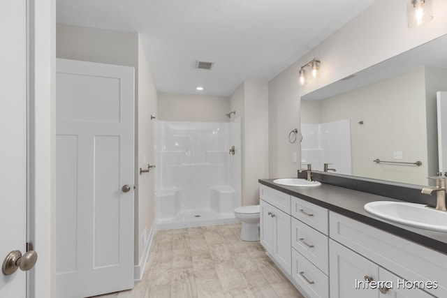 3349 Kings River St SW Unit 36, Wyoming, MI 49418 - bathroom with double vanity and a shower