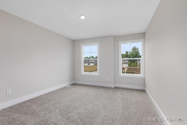 3349 Kings River St SW Unit 36, Wyoming, MI 49418 - empty room with carpet flooring and baseboards