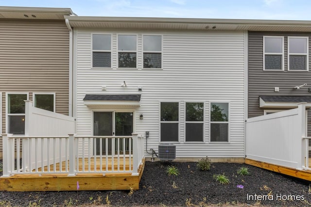 3349 Kings River St SW Unit 36, Wyoming, MI 49418 - rear view of house with a deck