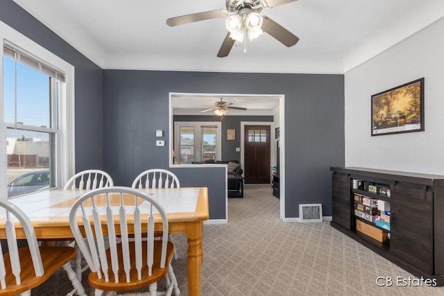 45 Murray St SW, Grand Rapids, MI 49548 - dining space with plenty of natural light, ceiling fan, and light colored carpet