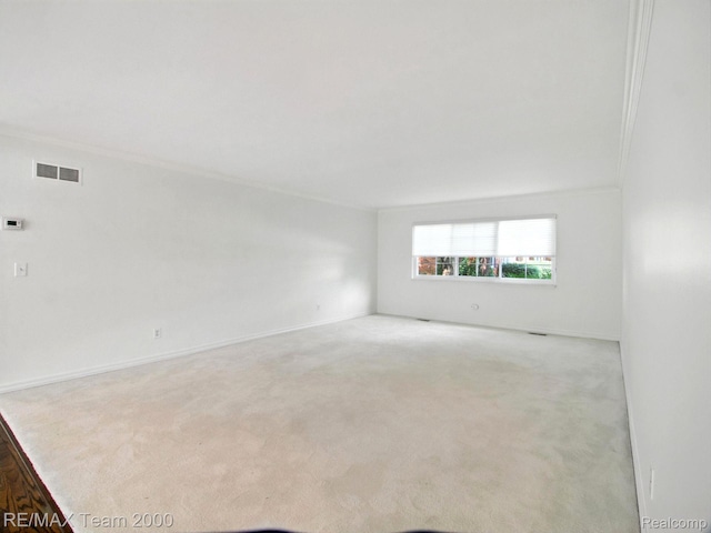 1711 Huntingwood Ln, Bloomfield Hills, MI 48304 - carpeted empty room featuring crown molding and baseboards