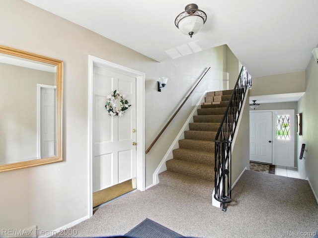1711 Huntingwood Ln, Bloomfield Hills, MI 48304 - carpeted foyer entrance with stairway