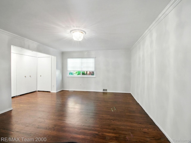 1711 Huntingwood Ln, Bloomfield Hills, MI 48304 - unfurnished bedroom featuring ornamental molding, wood finished floors, and a closet
