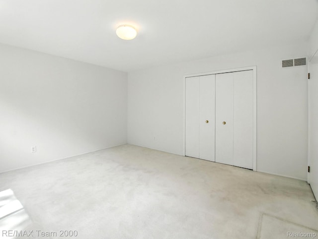 1711 Huntingwood Ln, Bloomfield Hills, MI 48304 - unfurnished bedroom with carpet flooring and a closet