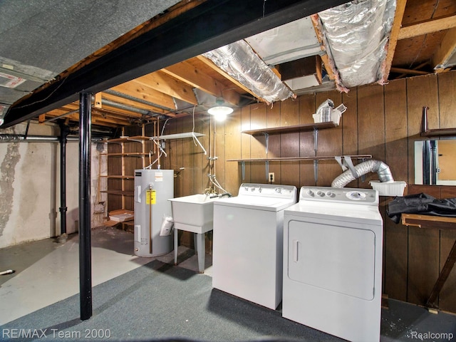 1711 Huntingwood Ln, Bloomfield Hills, MI 48304 - washroom with washing machine and dryer, water heater, and wood walls