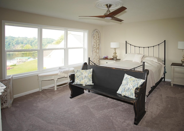 8440 Irish Mist, Onsted, MI 49265 - carpeted bedroom with baseboards and a ceiling fan