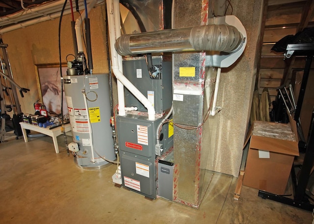 8440 Irish Mist, Onsted, MI 49265 - utility room with water heater and heating unit