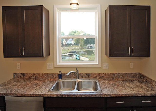 8440 Irish Mist, Onsted, MI 49265 - kitchen with dark brown cabinets, dishwasher, and dark countertops