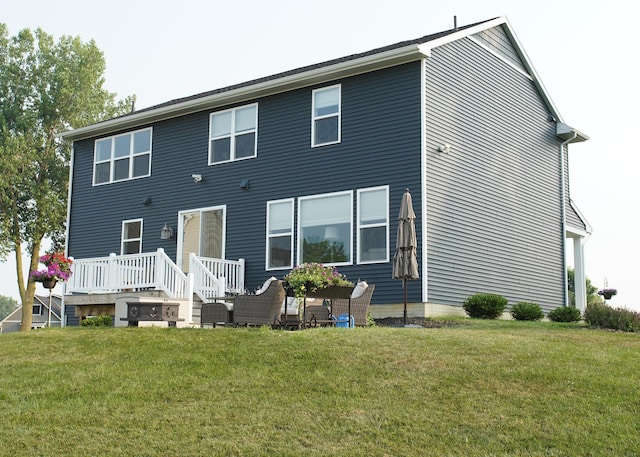 8440 Irish Mist, Onsted, MI 49265 - rear view of property with a lawn and a wooden deck