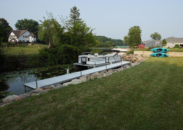 8440 Irish Mist, Onsted, MI 49265 - view of grassy yard featuring a water view and a dock