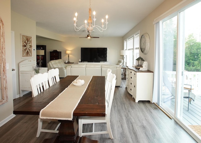 8440 Irish Mist, Onsted, MI 49265 - dining area with a chandelier and wood finished floors