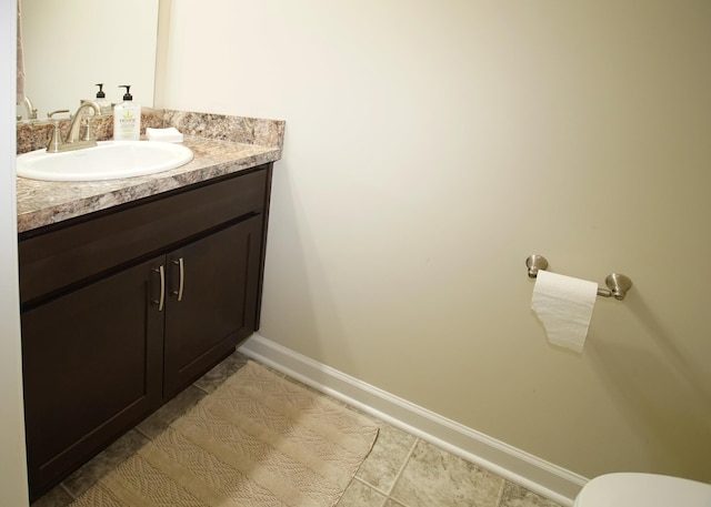 8440 Irish Mist, Onsted, MI 49265 - half bath featuring vanity and tile patterned flooring