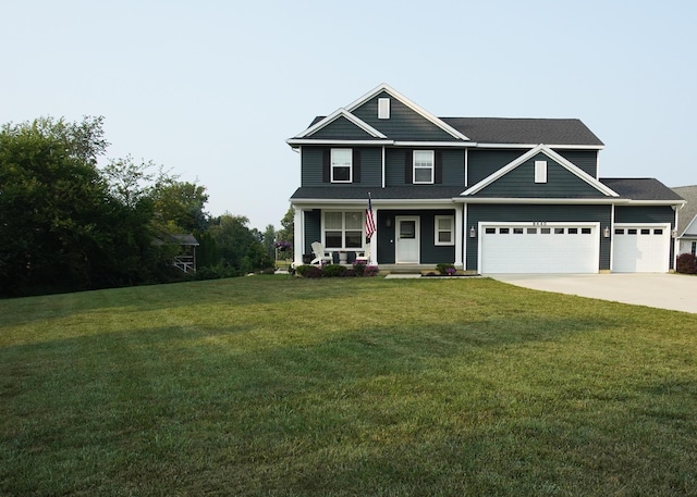 8440 Irish Mist, Onsted, MI 49265 - view of front of home with concrete driveway, a porch, a front lawn, and a garage